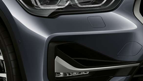 BMW X1, LED-þokuljós. BMW X1, nærmynd af LED-þokuljósum.