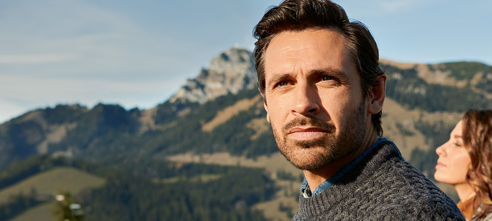 Man looks confidently into the distance Original BMW services and accessories for autumn and winter